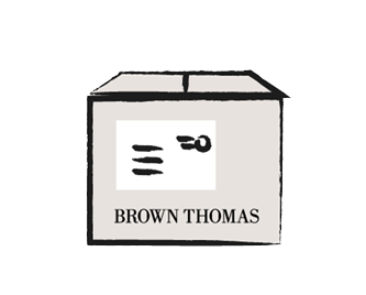 A cardboard box with a label and the text 'BROWN THOMAS' on it.
